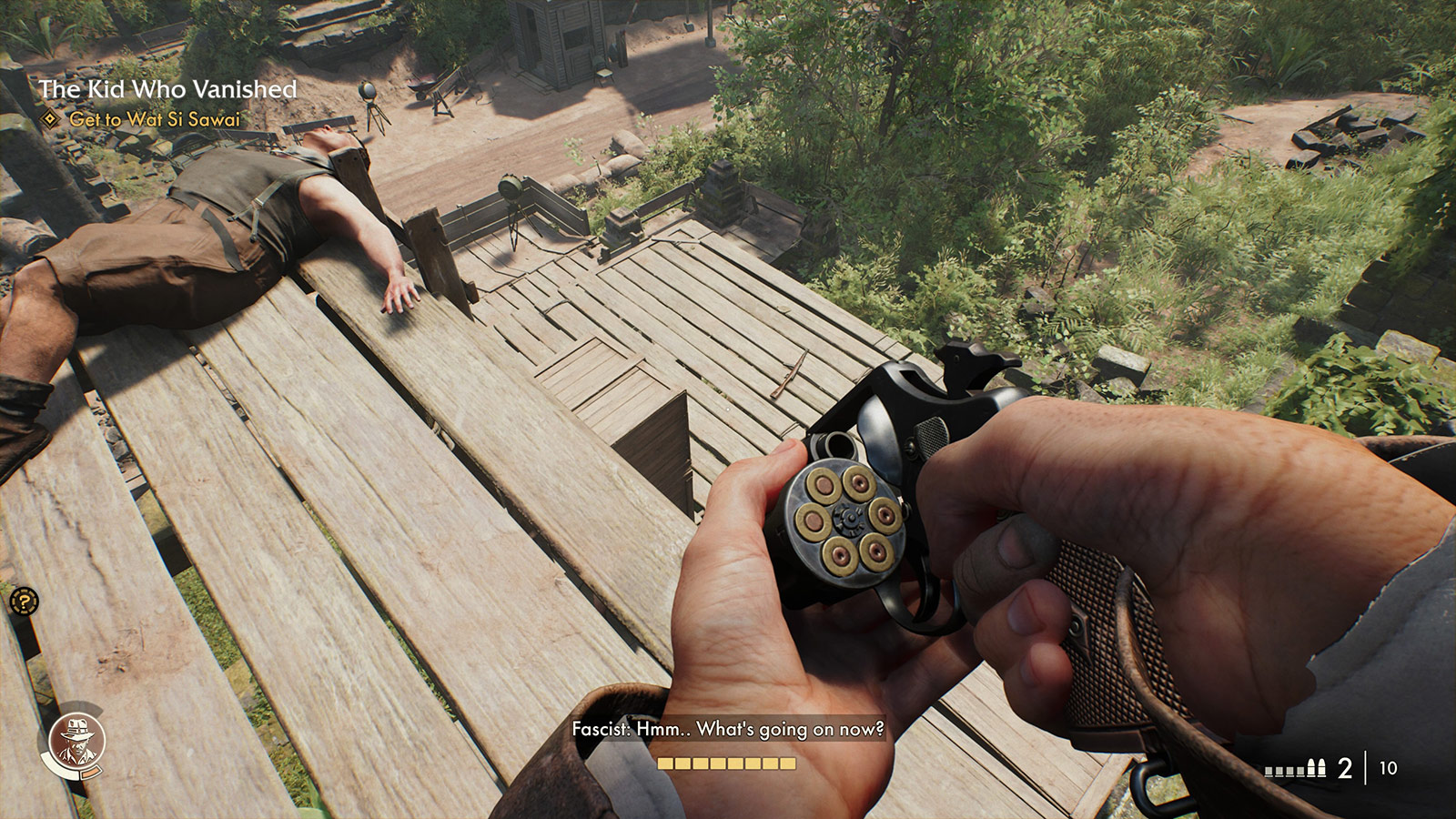 Looking down from atop a scaffold, reloading