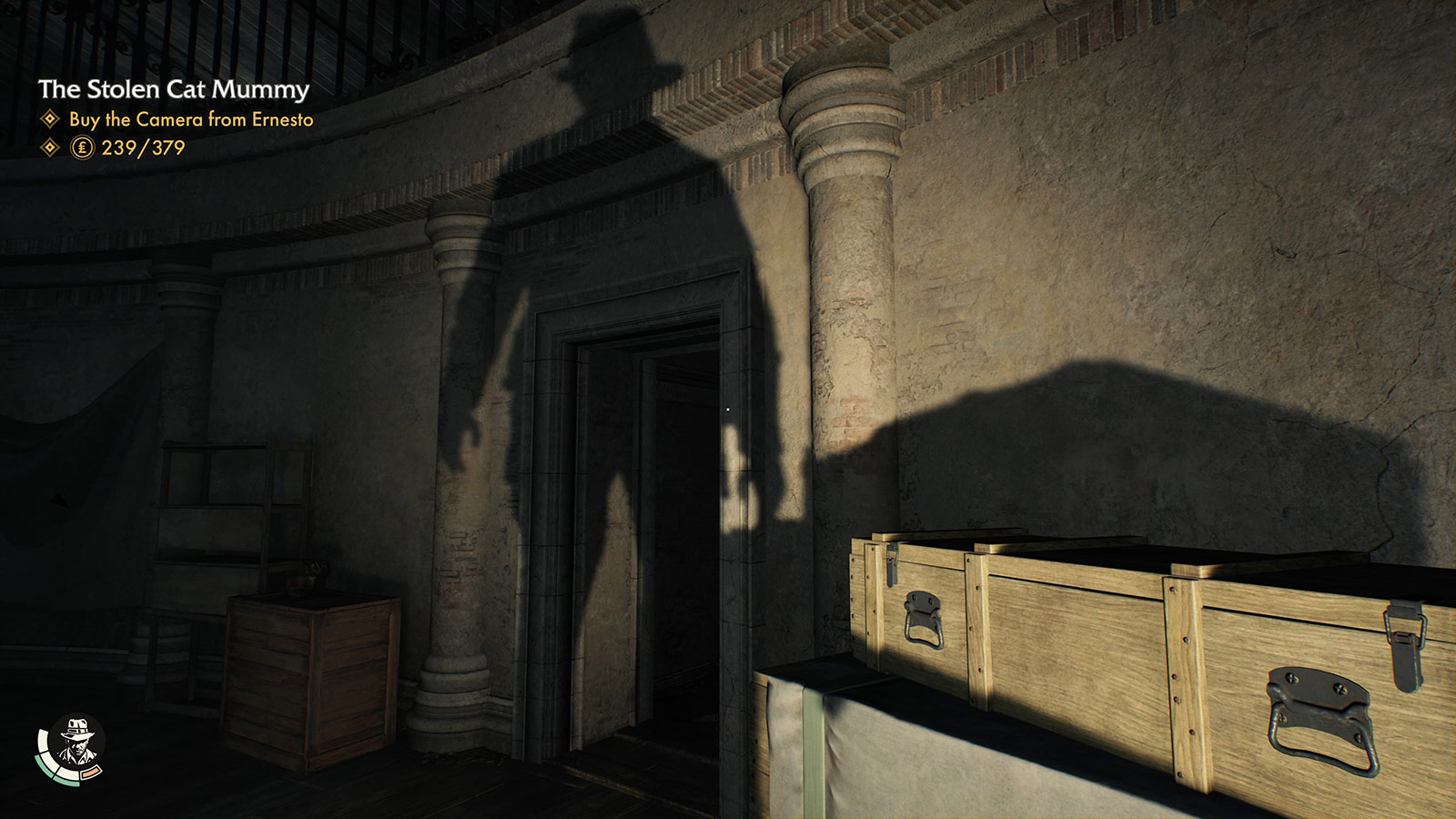 A spotlight casts Indy's shadow on the wall